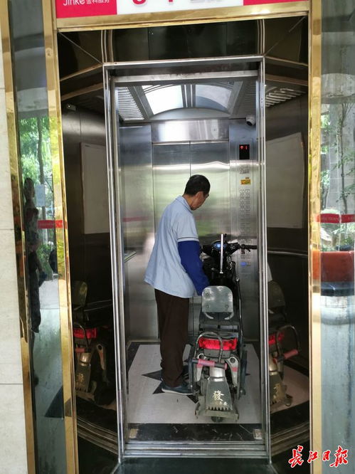 电动车推进来电梯就 罢工 ,武汉一小区给电梯装上了 智慧眼